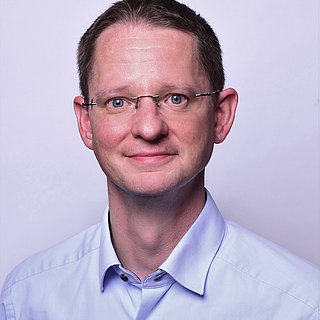 Das Bild zeigt Herrn Sebastian Flecken